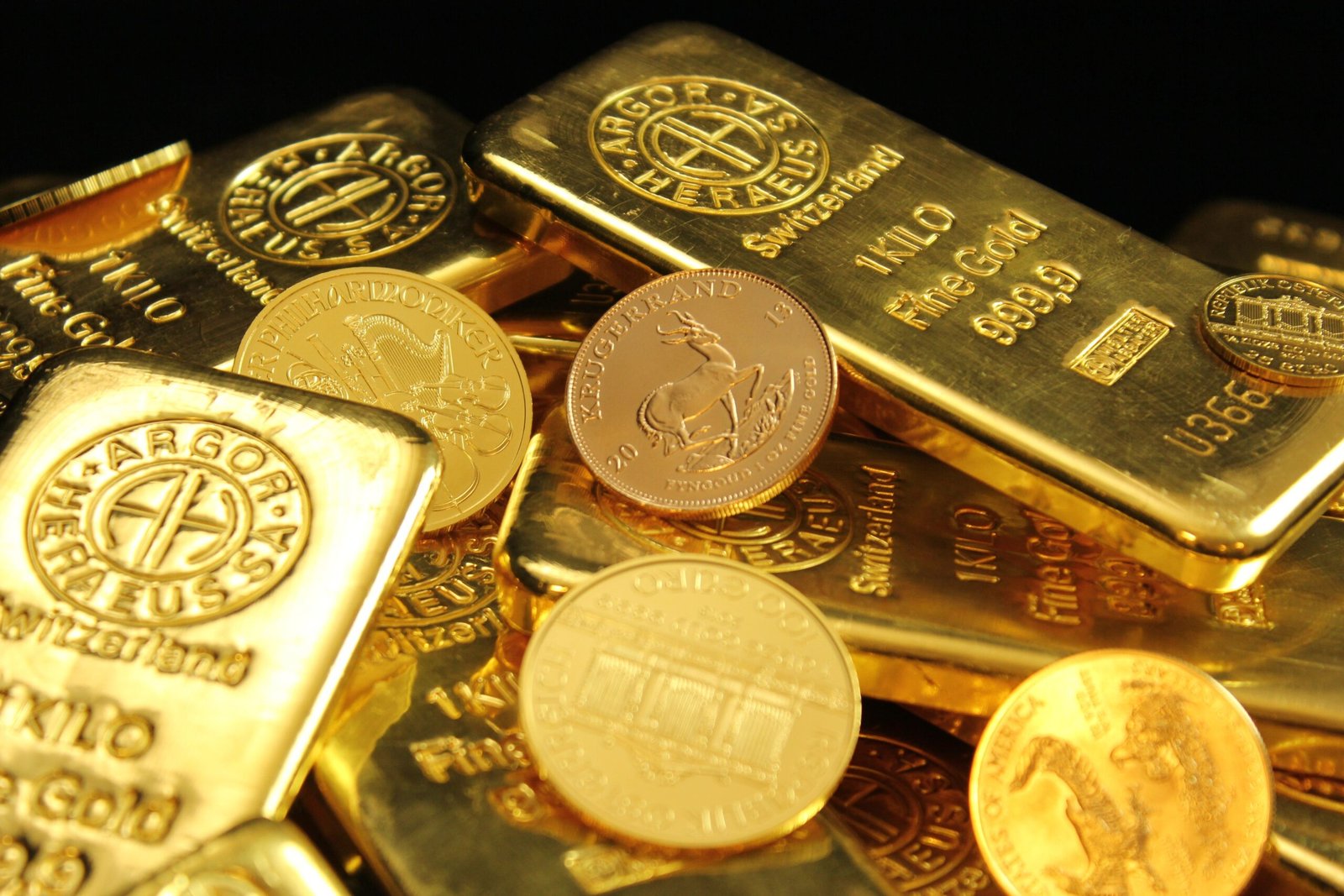 Gold and silver bullion coins representing silver price movement